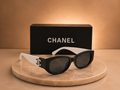 CHANEL Two-Tone Rectangular Sunglasses – Black Frame with White Temples & Silver CC Logo