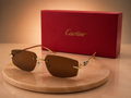 CARTIER Panthère Rimless Sunglasses – Gold Finish with Solid Brown Lenses