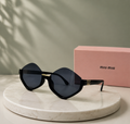 MIU MIU Black Diamond Geometric Sunglasses – Angular Rimless Top Acetate Frame with Gold Logo