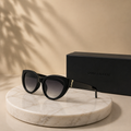 SAINT LAURENT Black Cat-Eye Sunglasses – Glossy Acetate Frame with Gold YSL Monogram