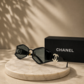 CHANEL Black Hexagonal Geometric Sunglasses – Gold Interlocking CC Logo Temples