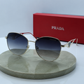 PRADA Cat-Eye Metal Sunglasses – Gold Wire Frame with Gradient Grey Lenses