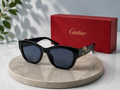 CARTIER Panthère Cat-Eye Sunglasses – Glossy Black Acetate Frame with Gold C-Hardware