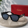 CARTIER Panthère Cat-Eye Sunglasses – Glossy Black Acetate Frame with Gold C-Hardware