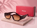 PRADA Symbole Hexagonal Sunglasses – Dark Burgundy Havana Frame