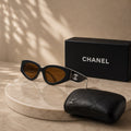 Chanel Oval Cat-Eye Sunglasses in Black & White with Brown Tinted Lenses