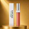Prada Reflection Glass Lip Gloss P258 – Soft Peachy Nude High-Shine Liquid Gloss